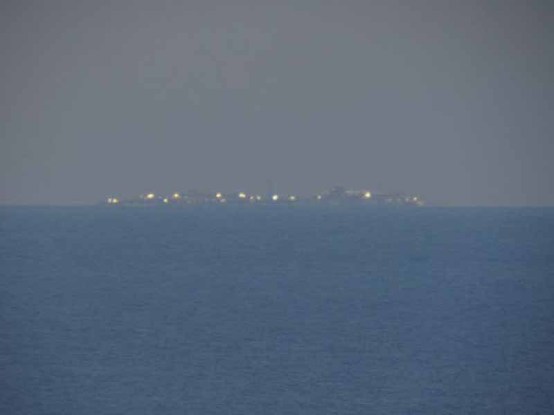 La Concordia vista dalla costa toscana 1 Costa Concordia dalla scogliera